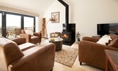 The Hemmel - cosy up on the sofa by the wood burning stove