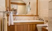 Bay View Cottage - the deep tub in the bathroom perfect for relaxing in