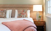 Blackhouse Forest Estate - pretty soft furnishings add warmth to bedroom one
