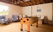 Wark Farmhouse - games room with table football and ample seating