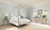 Honeystone House - bedroom six with four poster bed, sumptuous chaise longue and Roberts DAB radio