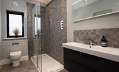 Duneside House - ground floor shower room with large walk-in shower with rainforest shower head and additional attachment