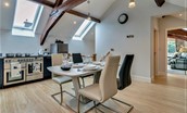 Roundhill Coach House - wonderful feature beams in the light and airy kitchen dining room