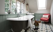Rowchester West Lodge - the olive green claw foot bath is perfect for a long hot soak after a busy day exploring