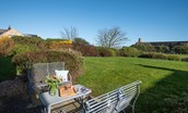 Bamburgh Five - relax on the patio or take a walk around the large lawned communal garden