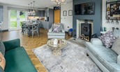 Bellshill Bothy - open-plan sitting room with dining area and kitchen beyond