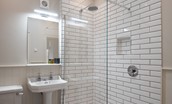 Cambridge House Cottage Number One - the en suite bathroom with walk-in shower, WC and basin