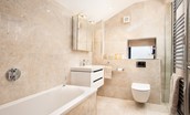 Tutor's Lodge - family bathroom featuring a bath with separate mixer, as well as a walk-in shower