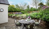 Pentland Cottage - outside dining space for four guests in the pretty rear garden