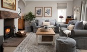 Greengate - sitting room with comfortable seating and cosy fire to relax in front of