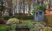 Bughtrig Cottage - the charming summer house with handcrafted bar hiding inside