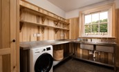 Papple Steading - Grieve's Cottage - utility / boot room with double sinks and washer / dryer