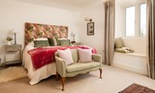 Swallow Dean - super king zip and link bed in the bedroom with window seat offering lovely country views