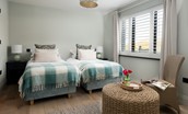 Seaside House - bedroom four with twin single beds that can be configured as a super king upon request