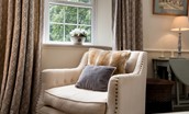 Wood Cottage - armchair in sitting room