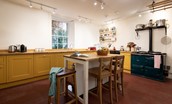 Church House - benefits from a spacious Shaker-style kitchen with two-oven AGA