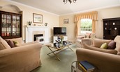 Eslington Lodge - sitting room with cosy 'coal-effect' fire and SmartTV