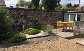Peewit Cottage - the sunny garden with outside seating area