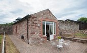 The Bothy at Dryburgh - the rear patio area leading to the living areas