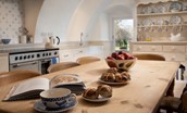 The Tower, Keith Marischal - rustic kitchen table with room for eight, Cookmaster double oven and charming dresser dotted with blue and white crockery