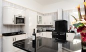 Dryburgh Farmhouse - modern open plan kitchen with range cooker and wine fridge