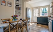 Spencer on the Lane - kitchen dining area with access to the rear courtyard