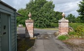 Crailing West Lodge - the ornate gate pillars at the entrance to the cottage