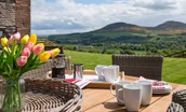 Granary - sunny outdoor seating area overlooking the Eildon hills