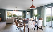 Overthickside - dining table in the open-plan living space with seating for six guests