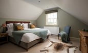 Risingham Cottage - bedroom three with super king size bed that can be split into twins