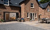 Partridge Lodge - the extensive terrace area; perfect for alfresco dining with a BBQ also provided