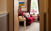 Bank View - welcoming sitting room with deep red velvet sofa