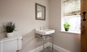Mill Cottage, Brockmill Farm - ground floor cloakroom with hanging space, WC and basin