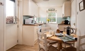 Daffodil Cottage - the kitchen with door leading out to garden