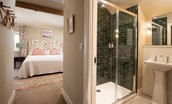 Brunton Granary - en-suite shower room with large walk-in shower, WC, and basin