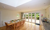 Hawthorn House - view out to the garden and patio area from the spacious kitchen