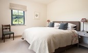 Housedon Haugh - bedroom two with a superking bed and double aspect views