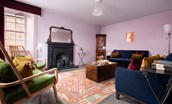 Papple Steading - Grieve's Cottage - sitting room with an open-fire and seating for eight guests