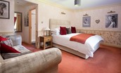 Dryburgh Farmhouse - bedroom four with super king bed and sitting area