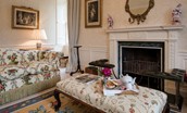 Edenside House - enjoy a warm buttered scone in the drawing room. Please note the fireplace is decorative only.