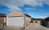 Number Nine, Lanchester - the parking area with double garage available for secure bike storage