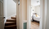 Number 107 - the single bedroom and staircase to the second floor