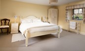 Bee Cottage - the spacious master bedroom features a king size bed