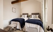 Brockmill Farmhouse - bedroom seven with zip and link beds and exposed beams