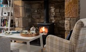 Peep-O-Sea Cottage - cosy up by the gas log burner set in the inglenook fireplace