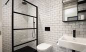2 The Bay, Coldingham - the en suite shower room has a large walk-in shower with a Crittall-style glass screen
