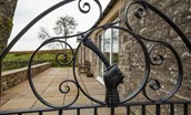 The Bothy at Redheugh - wrought iron gate leading into the front enclosed patio garden