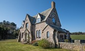 Lindisfarne View - the side aspect of the property with wonderful stained glass feature window