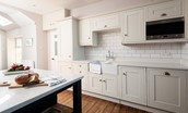 Sandsend - well-equipped shaker kitchen with two ovens, a grill oven range cooker, 5-ring induction hob, dishwasher, fridge/freezer, microwave, coffee machine and double Belfast sink