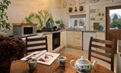 The Art House - the breakfast nook in the cosy kitchen